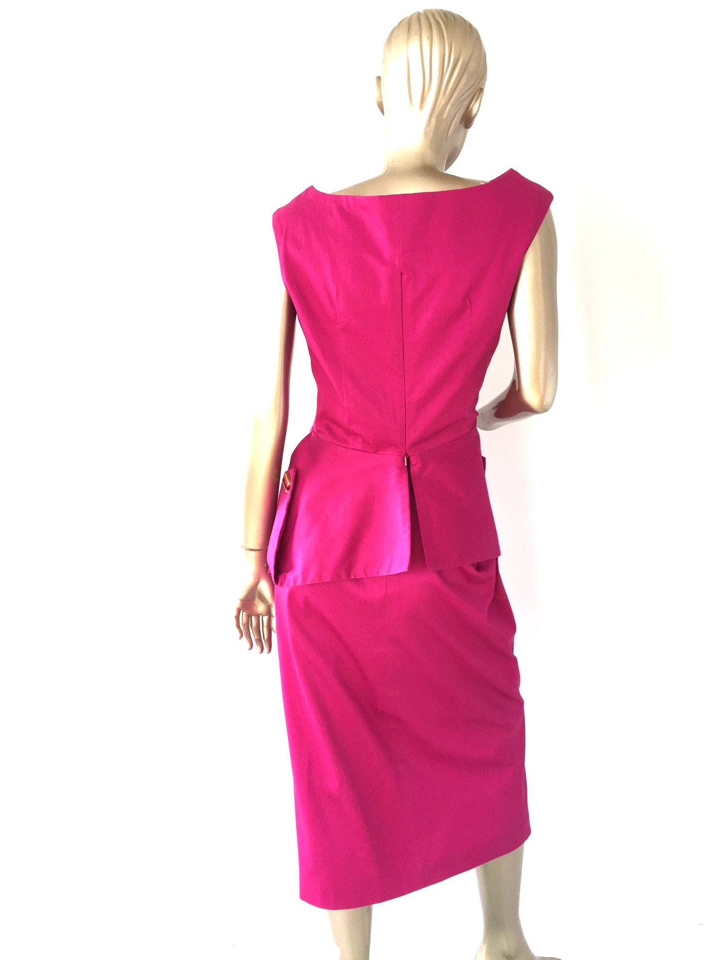 Pencil style skirt with pleats & Peplum style top in hot pink colour.