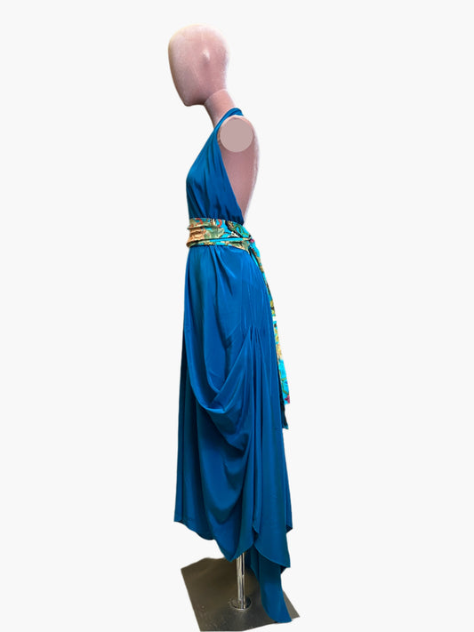 Elegant turquoise silk goddess dress with flowing drape and flattering silhouette.Wide attached multicoloured sash belt.