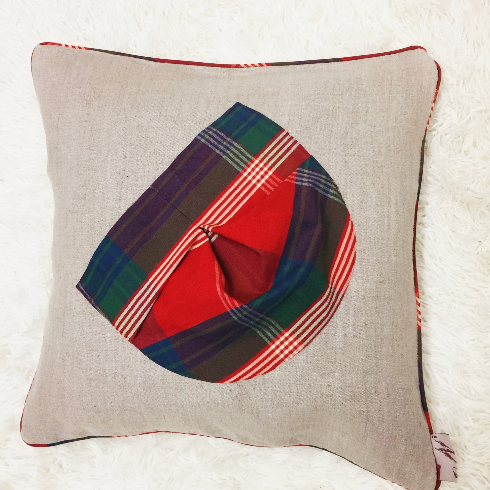 Natural colour linen  cushion-with check cotton pocket in front and piping details 