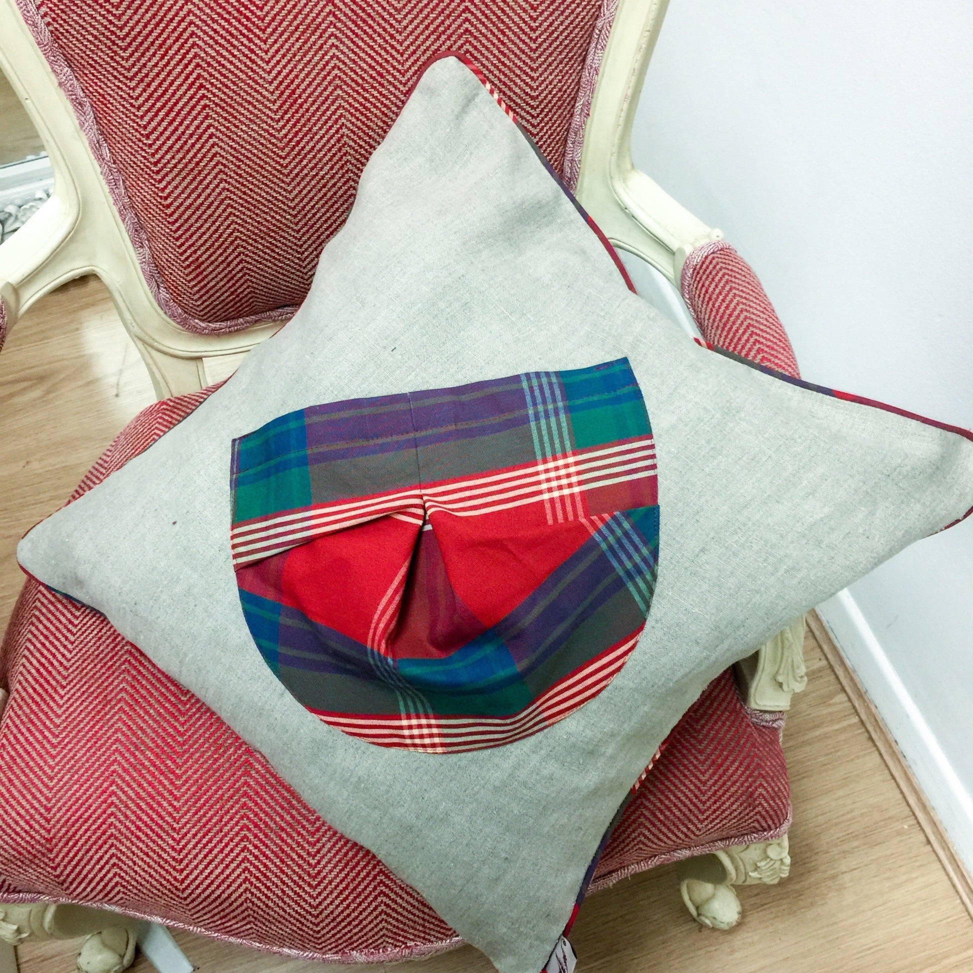 Natural colour linen  cushion-with check cotton pocket in front and piping details 