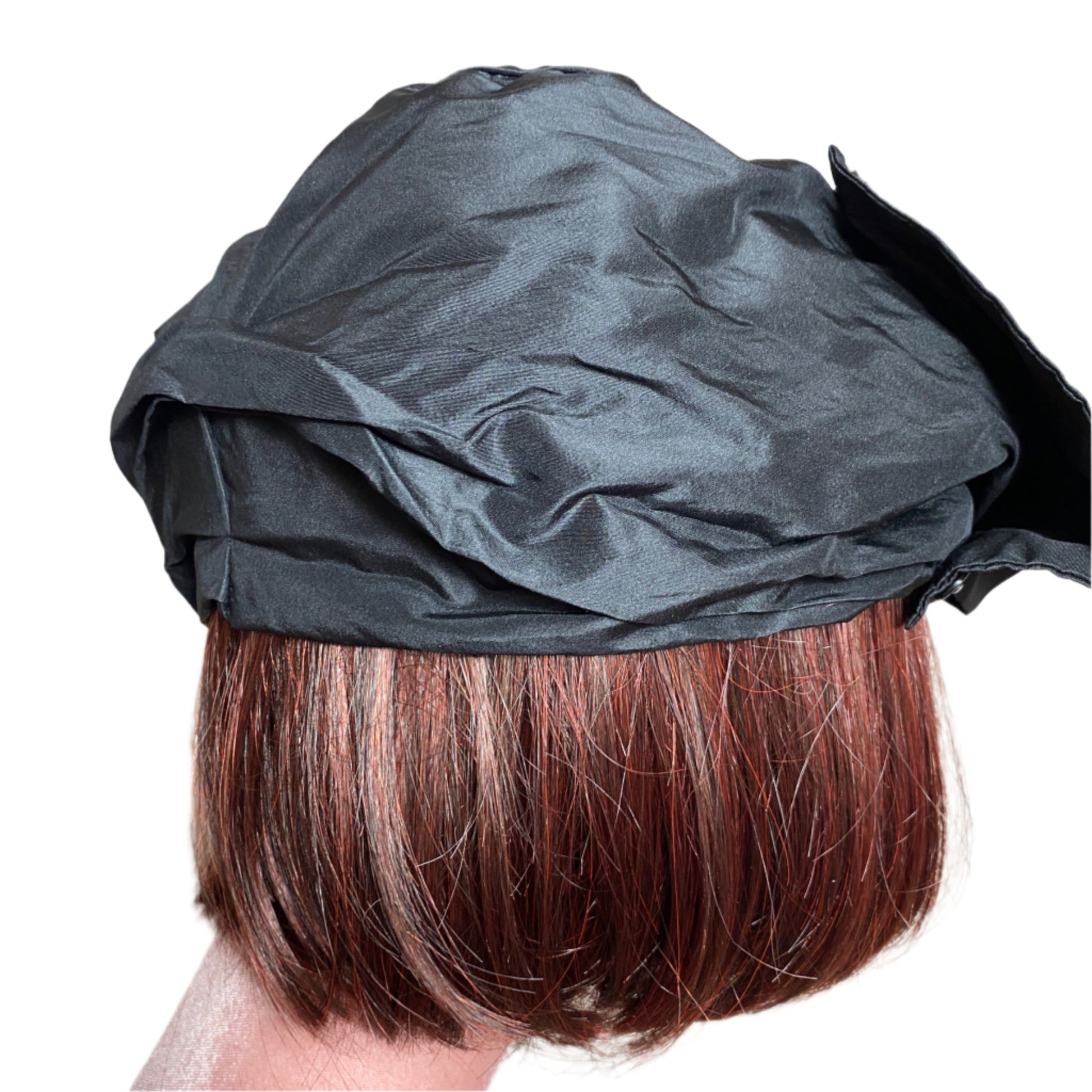 Elegant silk taffeta turban with a luxurious sheen, designed for a sophisticated and stylish look. Perfect for special occasions or adding a chic touch to everyday outfits.