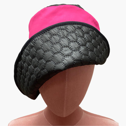 Handmade vintage-style,in mix fibres  hot pink and black fabric,with structured brim and elegant trim, perfect for classic and timeless fashion.