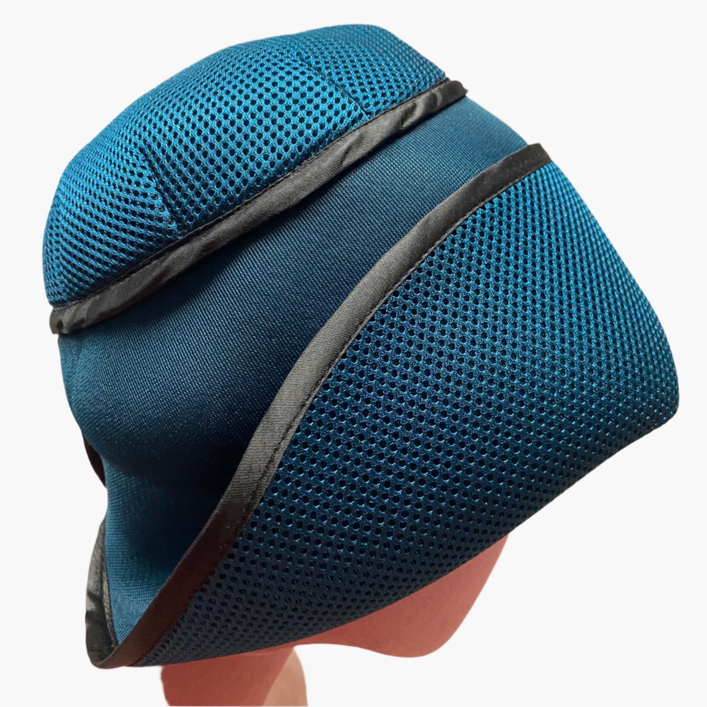 Handmade vintage-style,in petrol blue neoprene fabric,with structured brim and elegant trim, perfect for classic and timeless fashion.